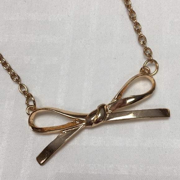 Gold Colored Bow Fashion Necklace - Picture 2 of 3